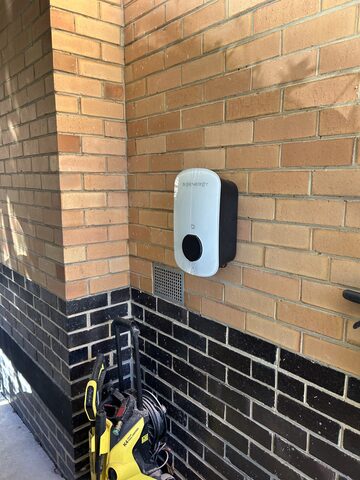 EV charger mounted on a brick wall in Ringwood East